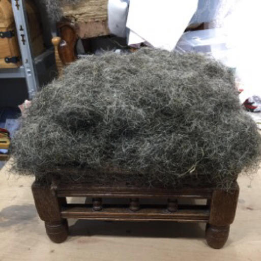 Small Footstool with stuffings added.