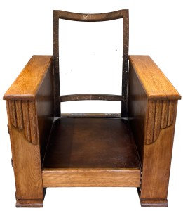 Chair with cushion removed and fabric stripped off