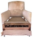 The spring hessian attached to the frame piece and wrapped around the roll