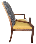 Chair with arms cleared off - broken arm resting on seat.