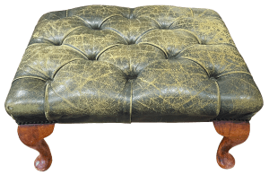 The original stool with pleated and buttoned leather cover.