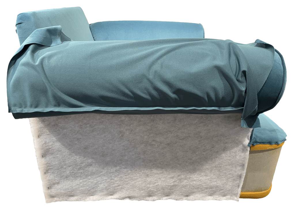 Chair with outer arm fabric attached under the arm