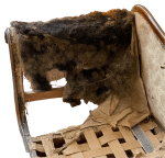 One arm with missing stuffings and supports