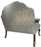 The finished sofa from the back with new nailing trim