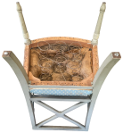 The chair springs under the seat.