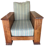 The chair with original cover from front.