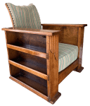The chair side with bookcase.